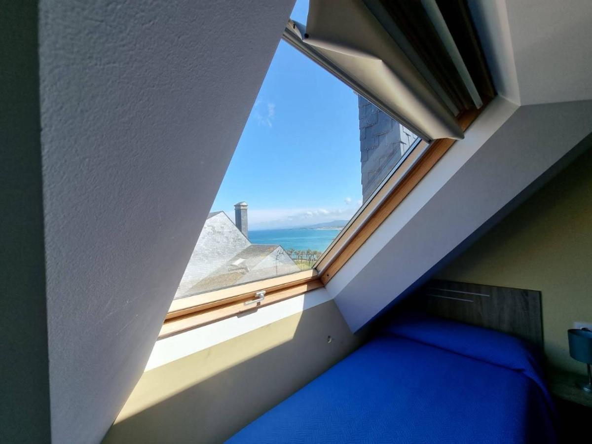 Vivienda de tres dormitorios en primera línea de playa Foz Exterior foto