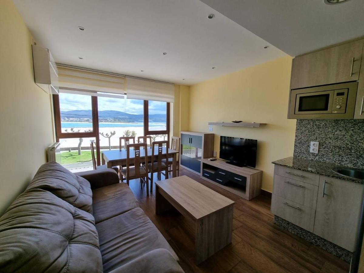 Vivienda de tres dormitorios en primera línea de playa Foz Exterior foto