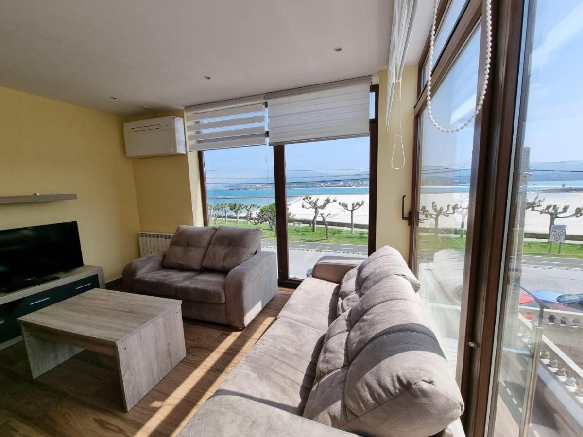 Vivienda de tres dormitorios en primera línea de playa Foz Exterior foto